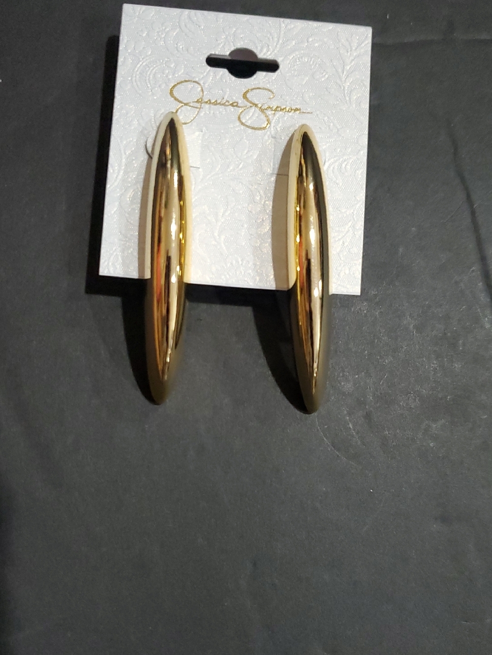 Jessica Simpson gold tone skinny‎ bean horn dagger style earrings brand new
